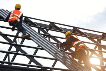 Men Installing New Roof – Melbourne, VIC – Catco Plumbing