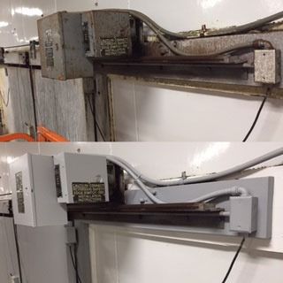 Before-and-after photo of a mounted linear rail machine, rusted on top and refurbished white below