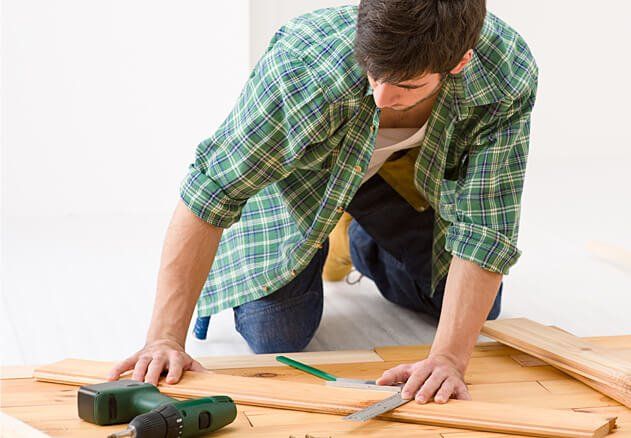 contractor cutting wood