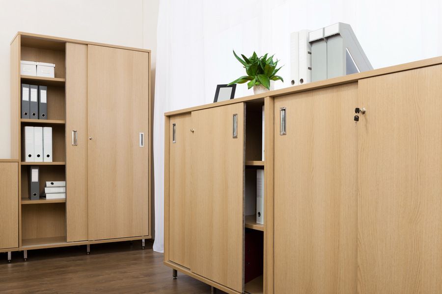 A Room With a Lot of Wooden Cabinets and Shelves — Bruce Smith Cabinets in Bray Park, NSW