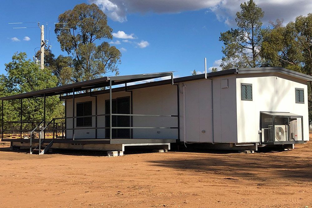 House With a Terrace Constructed on a Steel Roof and Fenced Area — OSM Transportables In Dubbo, NSW