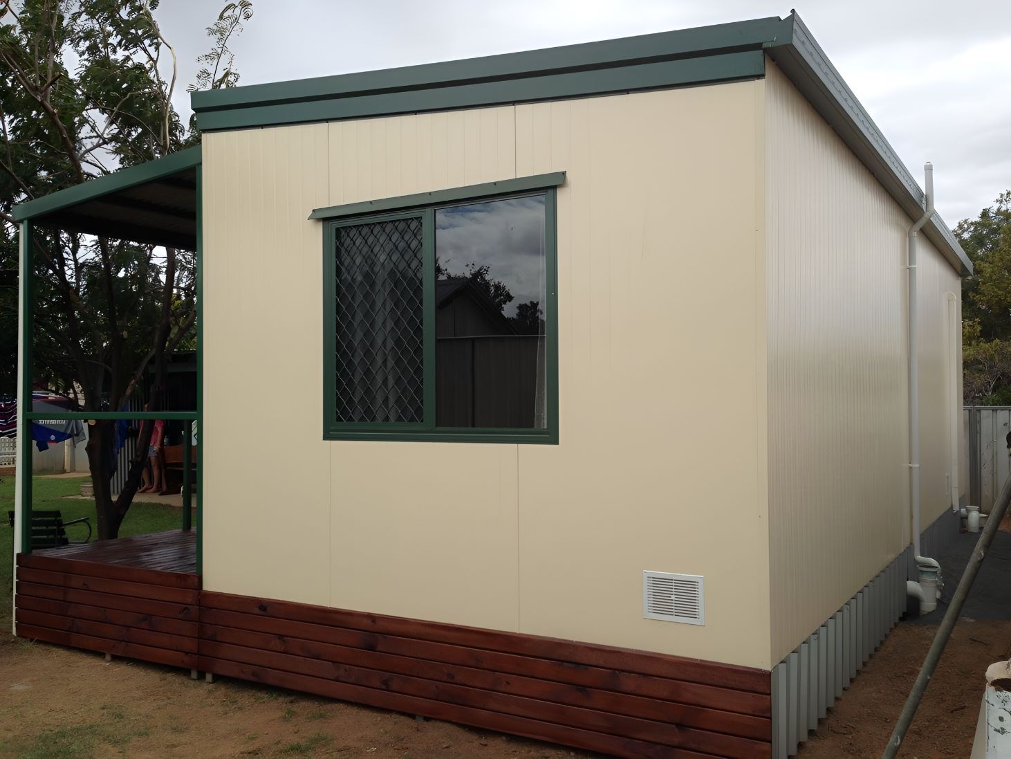 A Small White House With a Green Roof and a Window — OSM Transportables In Dunedoo, NSW