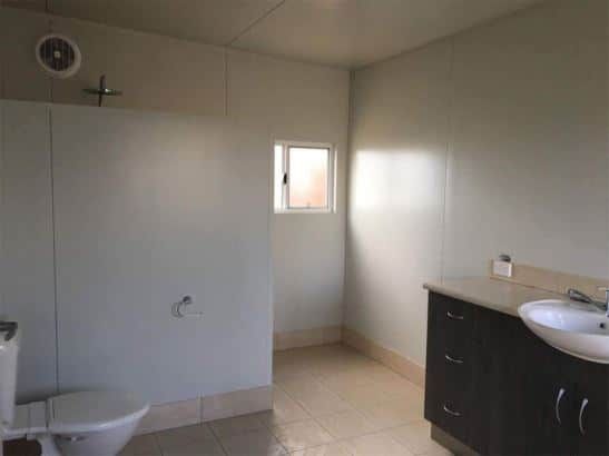 Comfortable White Bathroom Within a Portable Building — OSM Transportables In Dubbo, NSW