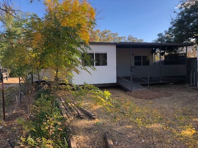 House Partially Shaded by a Tree, Creating a Harmonious and Natural Setting — OSM Transportables In Dubbo, NSW