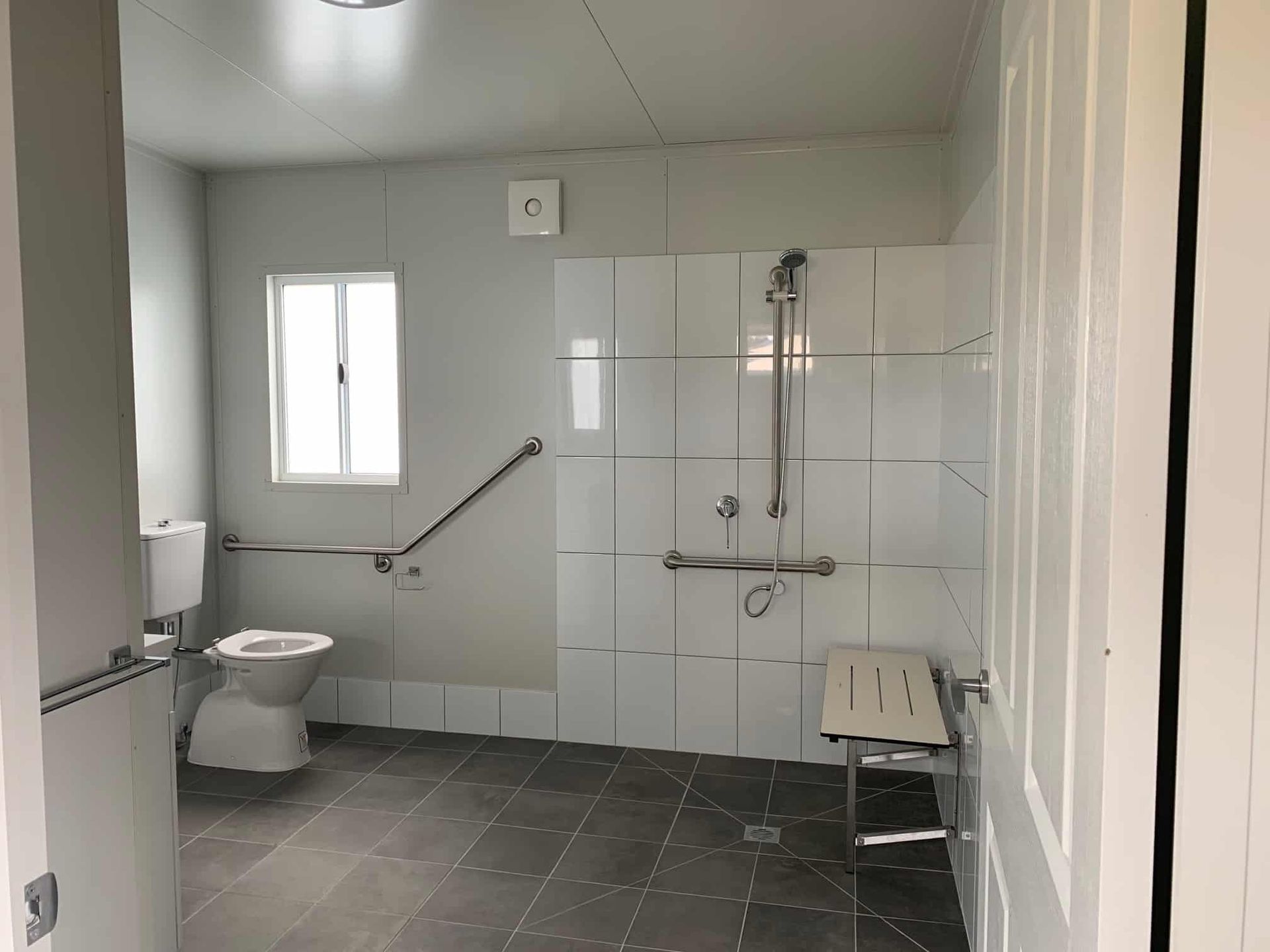 White Bathroom of a Portable House, Featuring Modern Design and Functionality — OSM Transportables In Dubbo, NSW