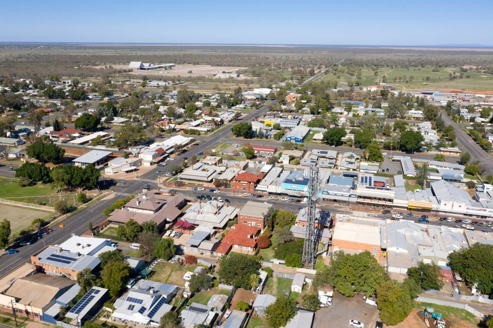 An Aerial View of a Small Town With Lots of Buildings and Trees — OSM Transportables In Bourke, NSW