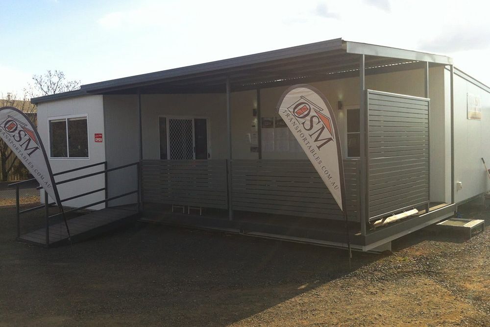 Newly Positioned Portable House Featuring Osm Transportable Signage — OSM Transportables In Dubbo, NSW