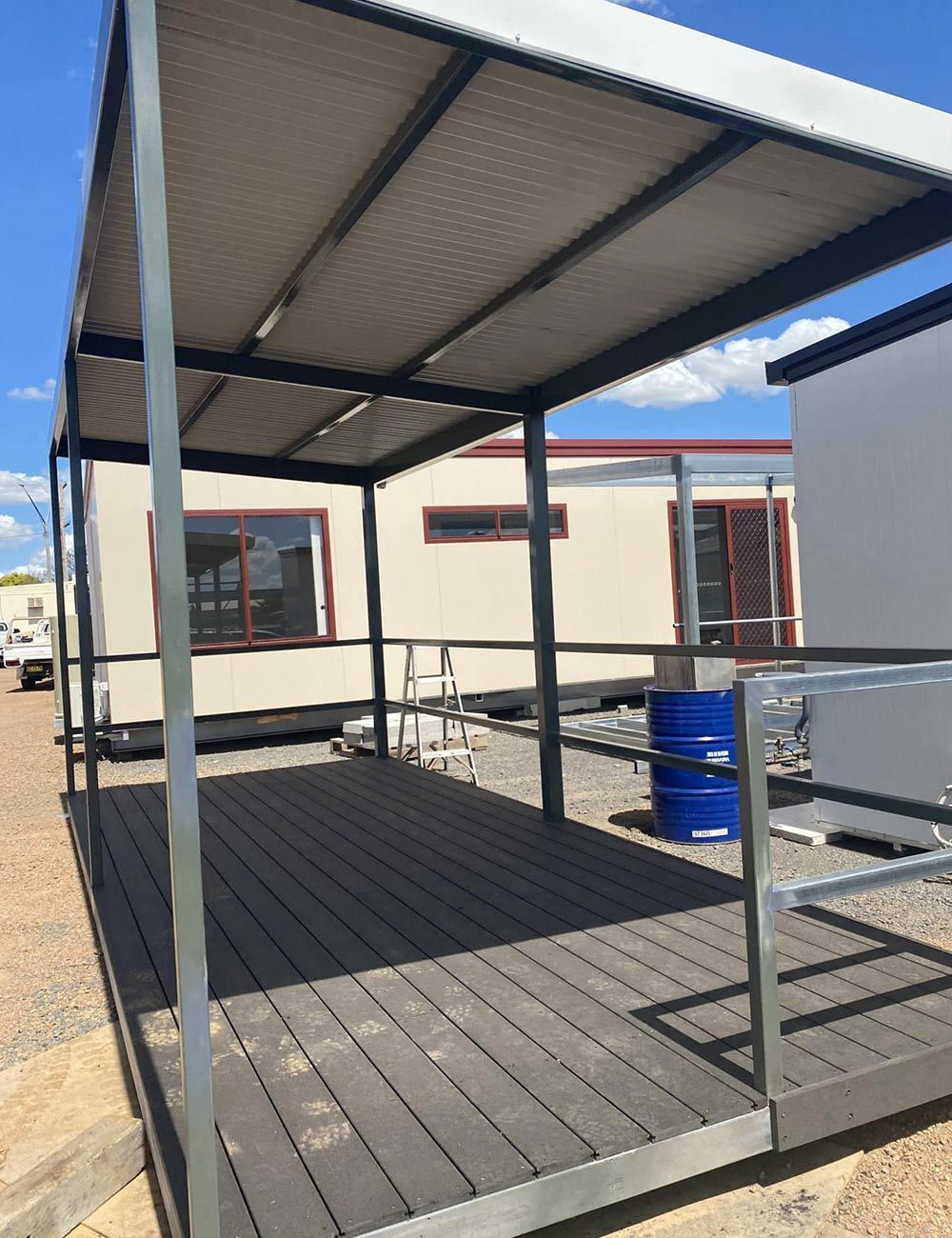 Veranda of an Under-construction Home, With the Transportable Home in the Background — OSM Transportables In Dubbo, NSW