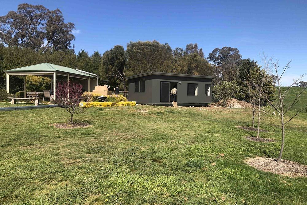 Panoramic View of a Transportable Dark Grey House and Patio — OSM Transportables In Dubbo, NSW