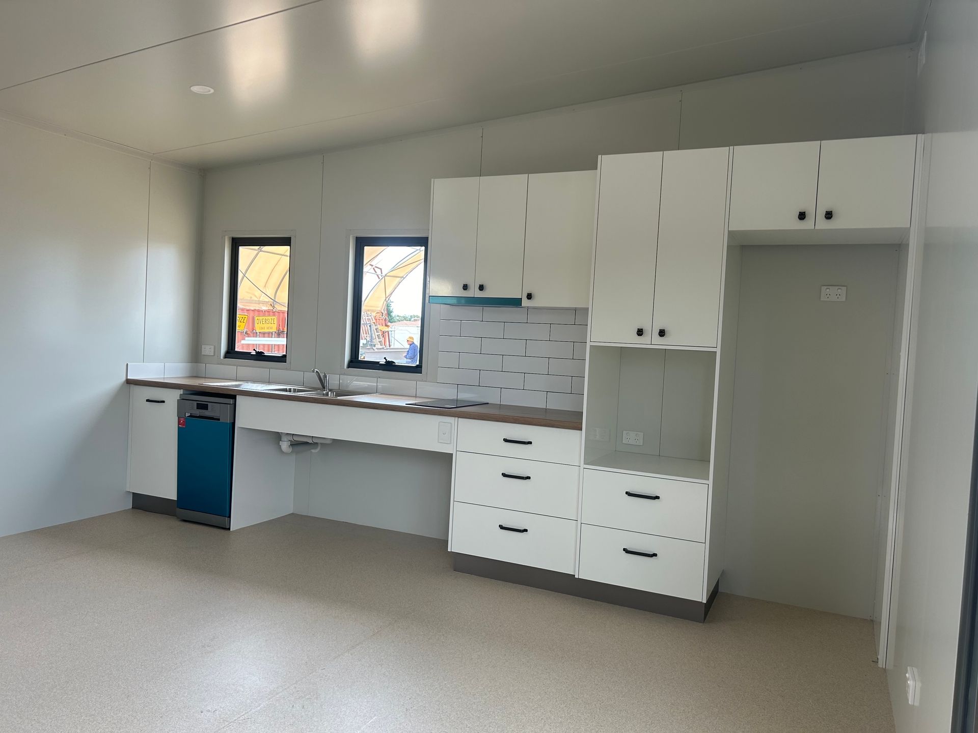 A White, Accessible Kitchen With Low Counters — OSM Transportables In Dubbo, NSW