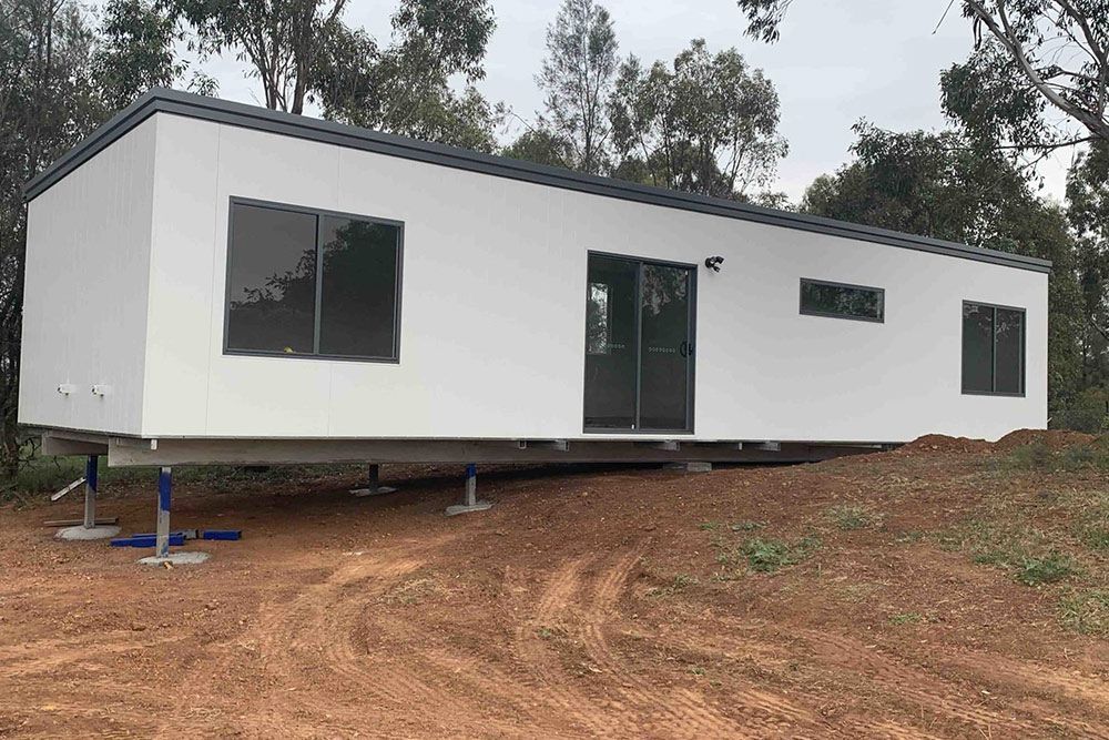 Newly Built Levelled Portable House With Window Glass and Door — OSM Transportables In Dubbo, NSW