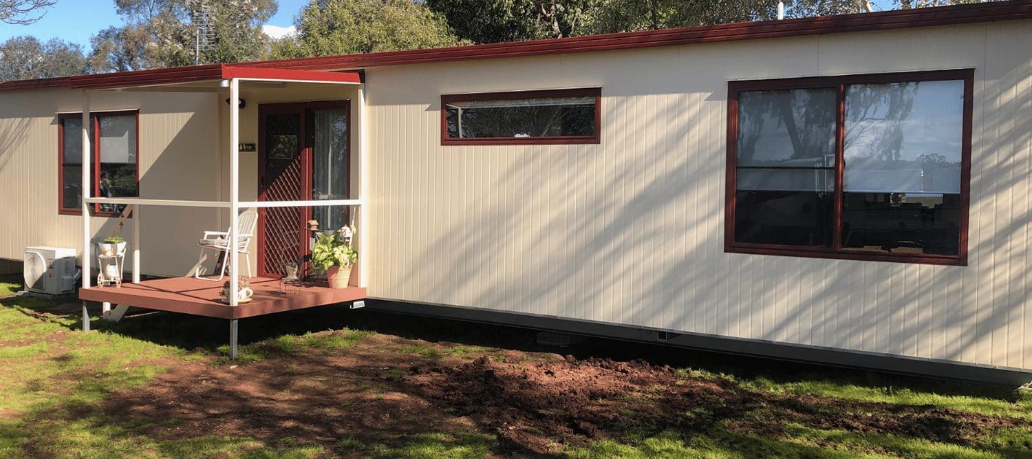 Long White House With a Red Roof and a Charming Terrace — OSM Transportables In Dubbo, NSW