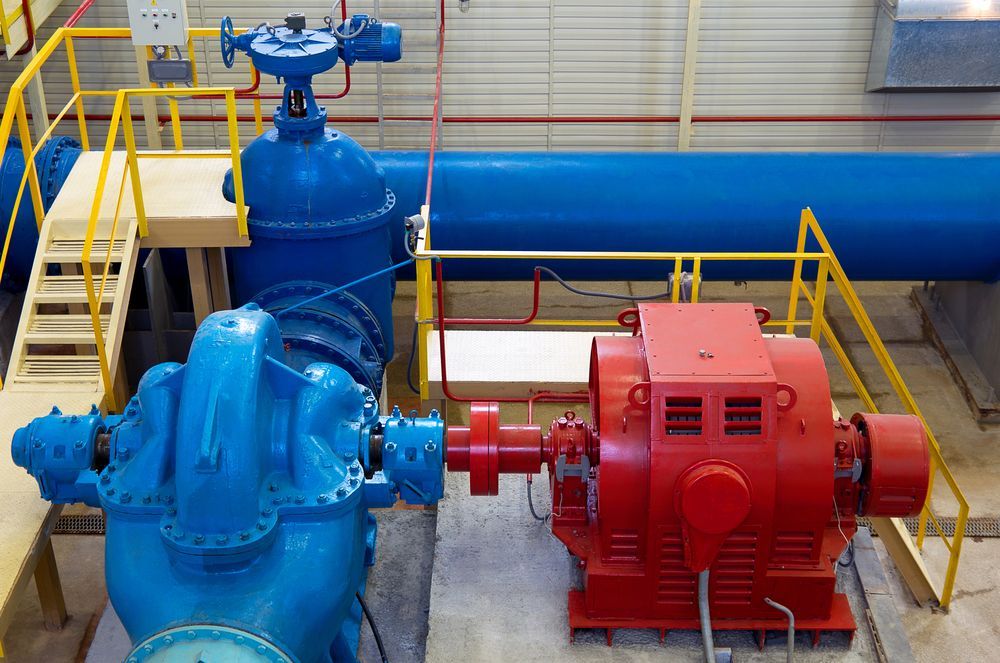 Red Motor Connected to Blue Water Pump — VR Marsden Plumbing in Red Rock, NSW