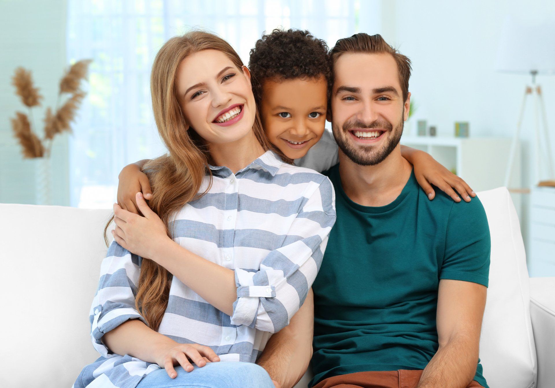A Happy Married Couple With Their Adopted Child, Family Law Baton Rouge LA