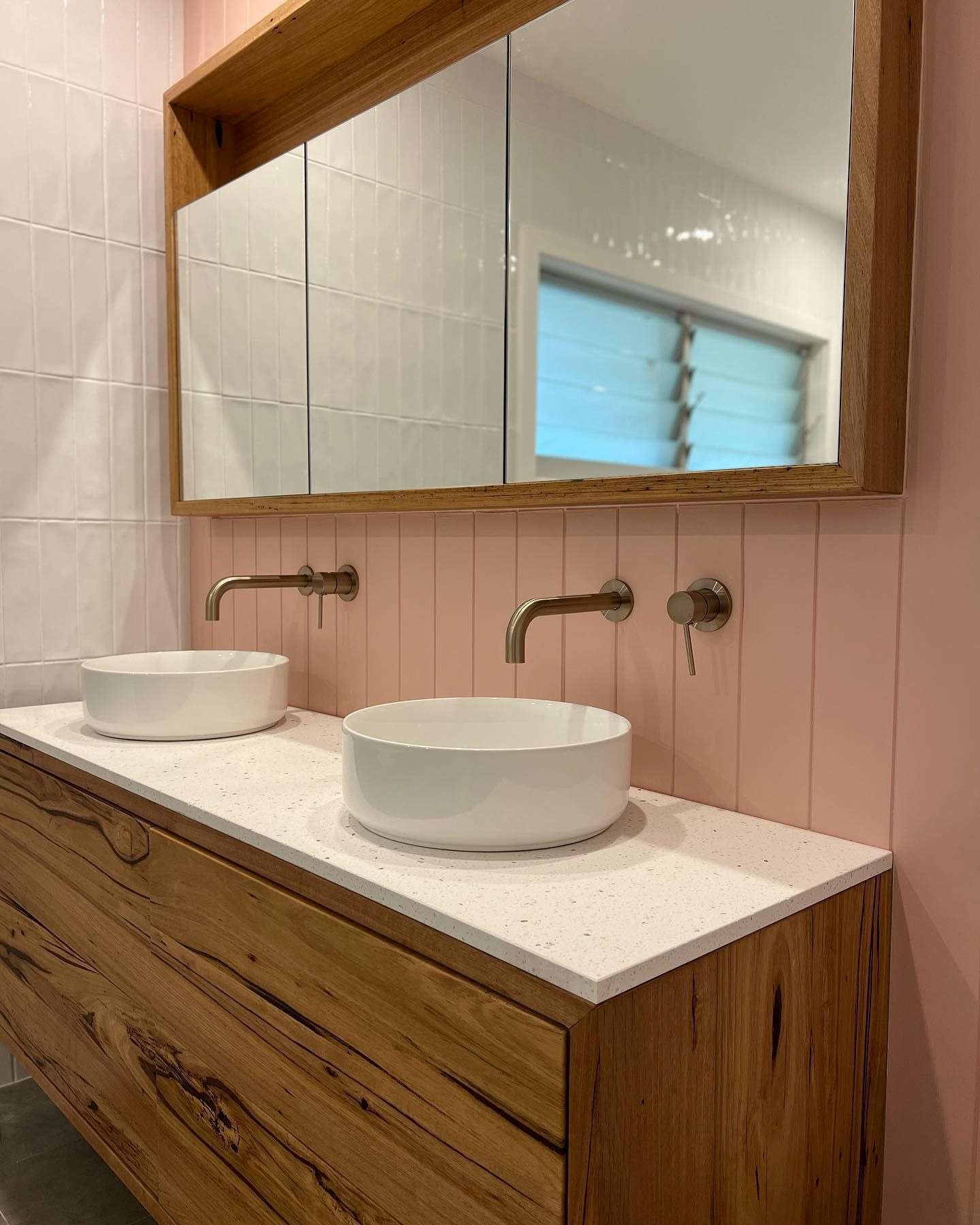 A Bathroom With Two Sinks And A Mirror — Hart Projects Wollongong In Dapto, NSW