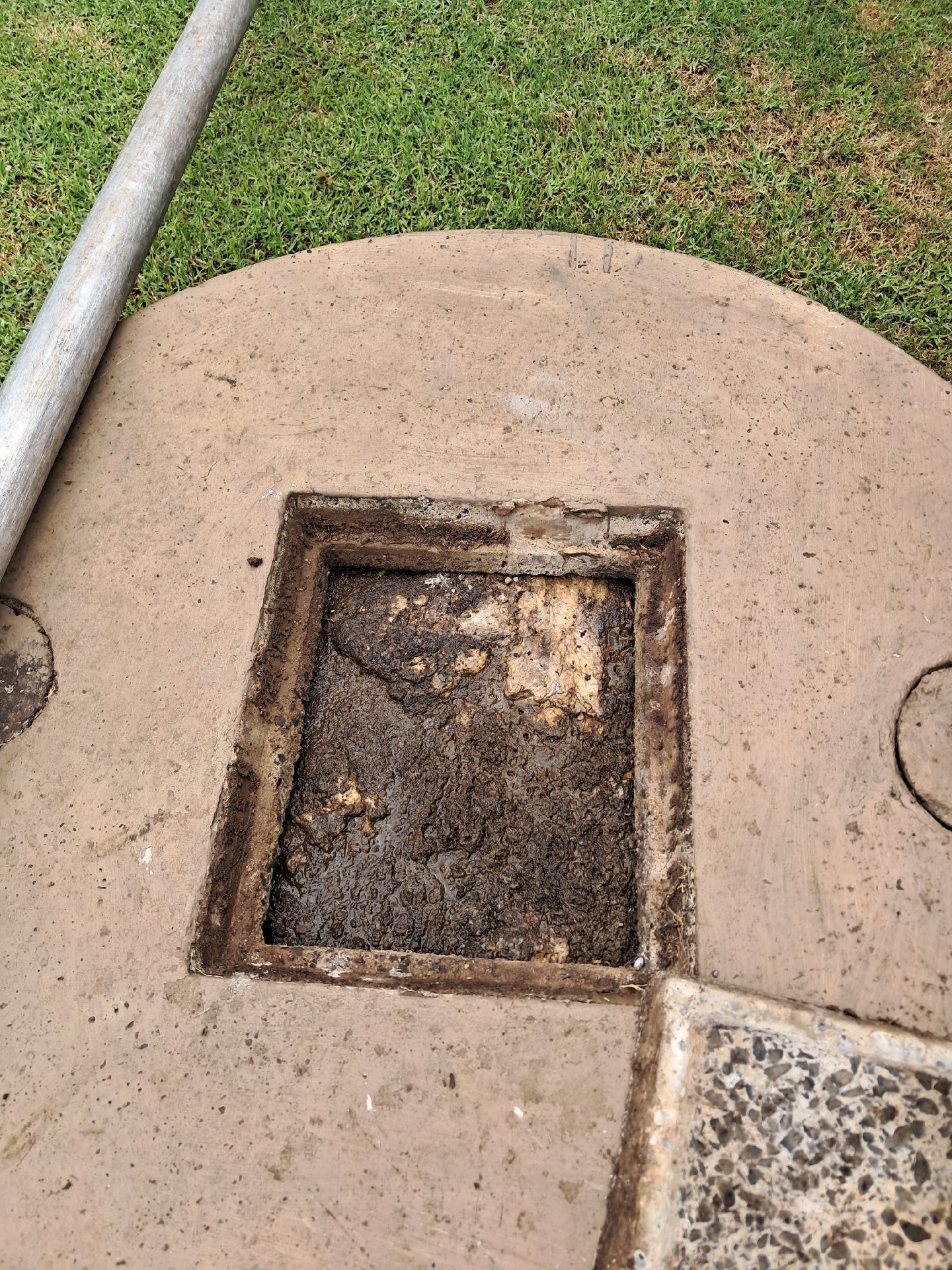 Concrete Utility Access Cover With a Recessed Square Opening — Shreks Septic Services in Gowrie Junction, QLD