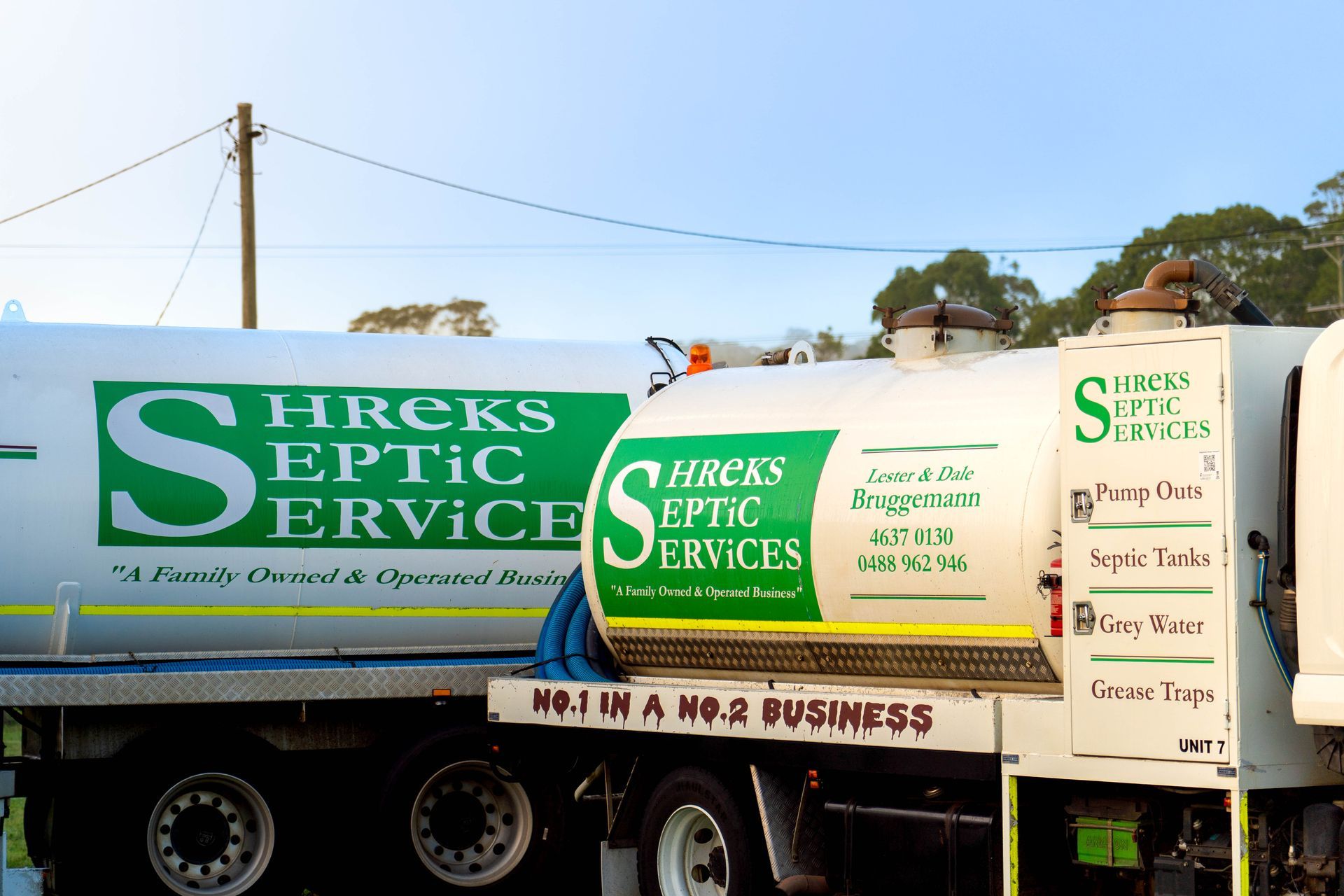 Green and Beige Shrek's Septic Services Truck Parked — Shreks Septic Services in Gowrie Junction, QLD