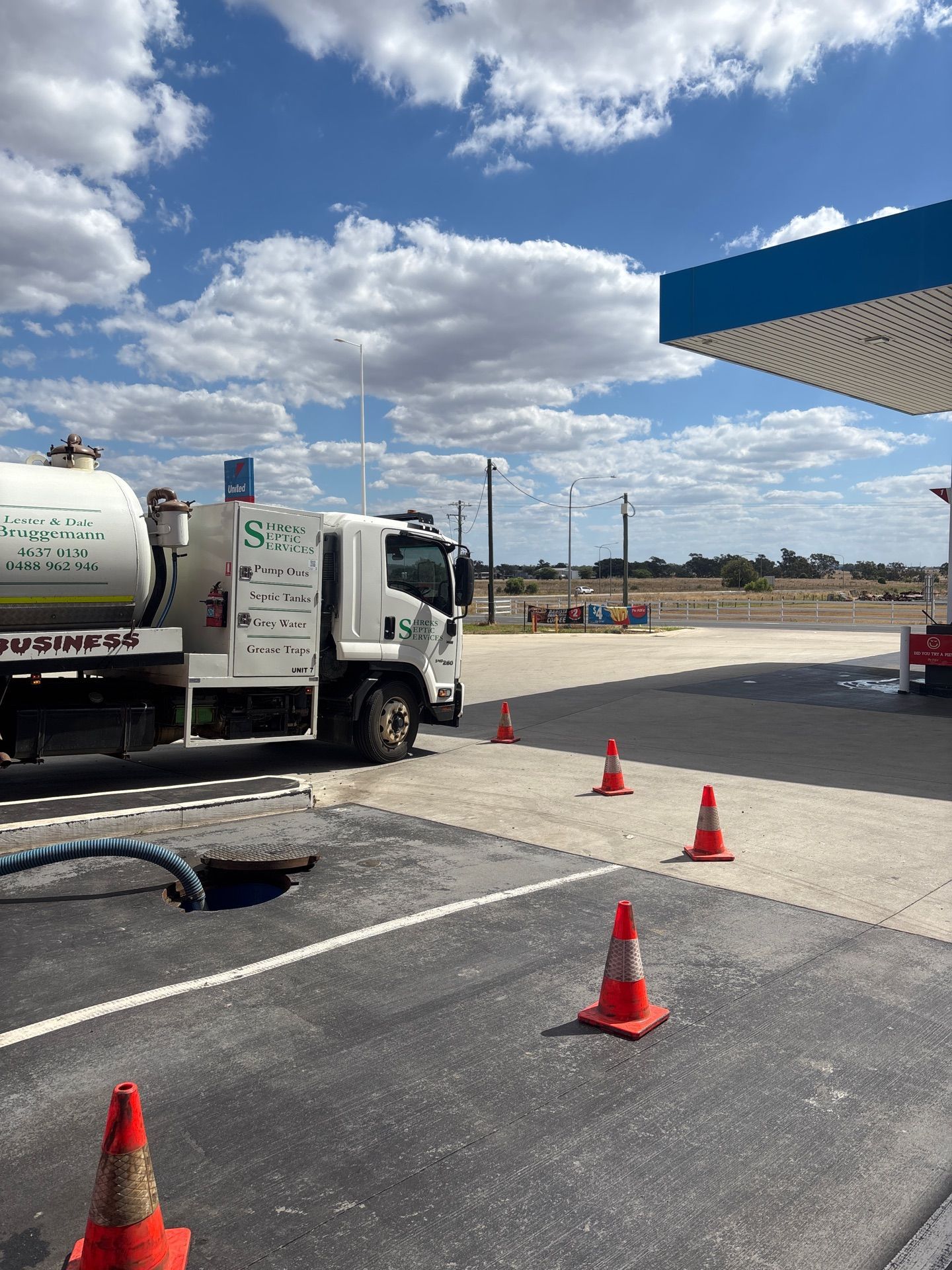 Construction Truck by a Roadwork Area — Shreks Septic Services in Highfields, QLD