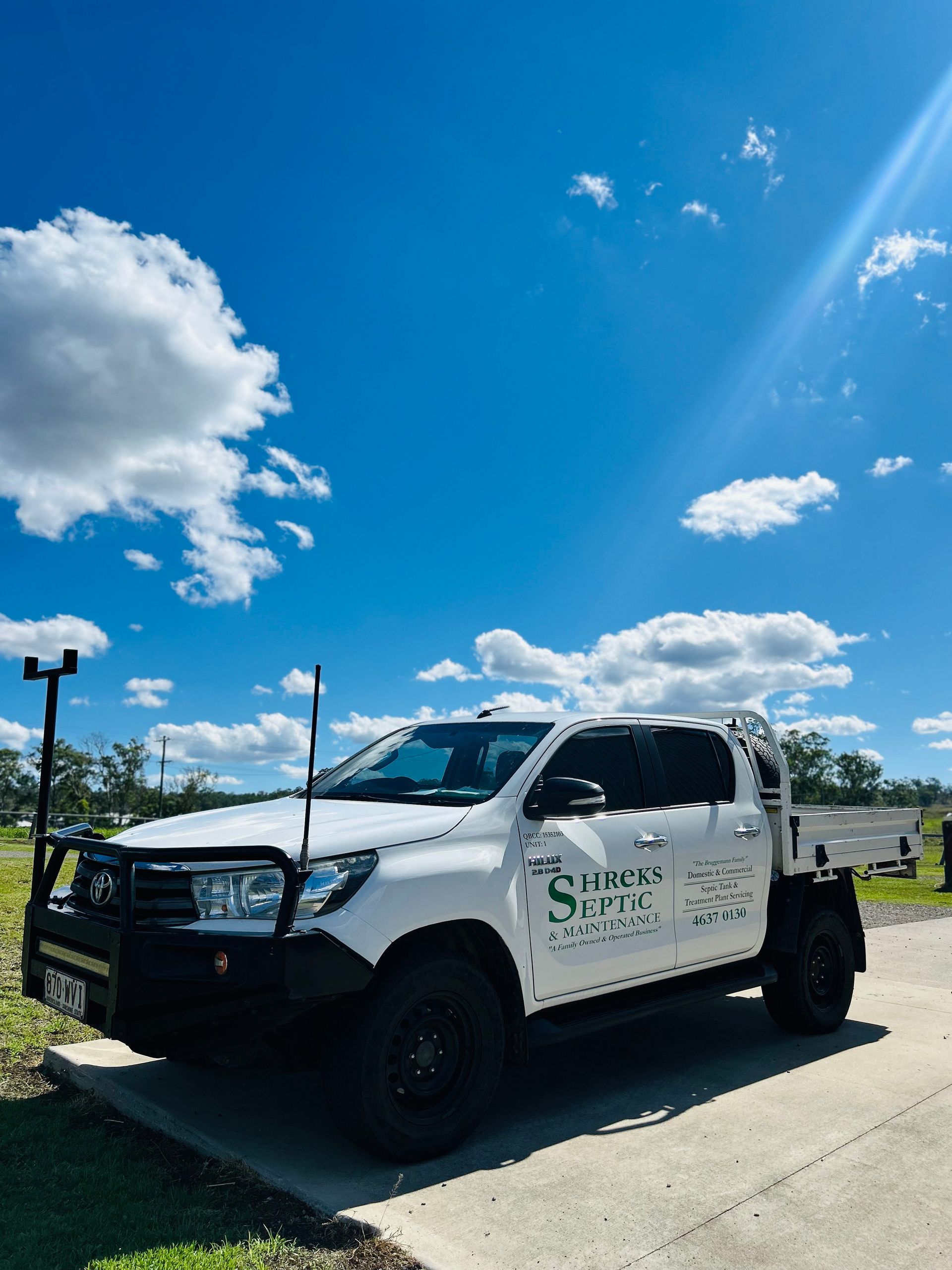 White Utility Truck Parked on a Sunny Road — Shreks Septic Services in Oakey, QLD
