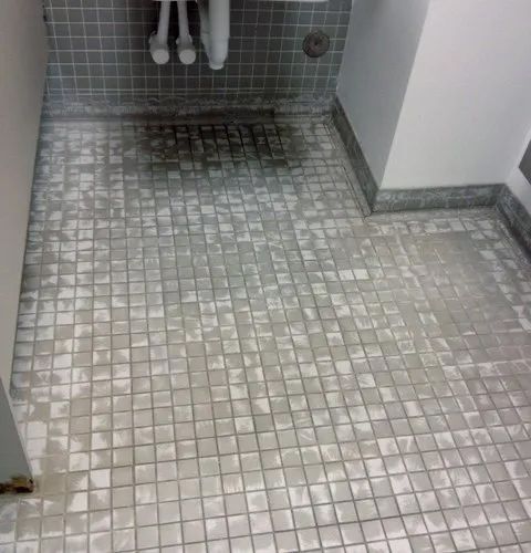 Before Old Tile in Corporate Restroom — Darien, IL — Sterling Services