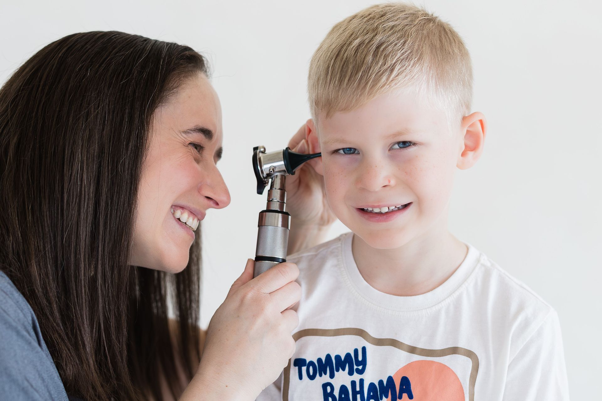 Dr. Wiersma,  top pediatrician in Scottsdale, AZ, examining a male child