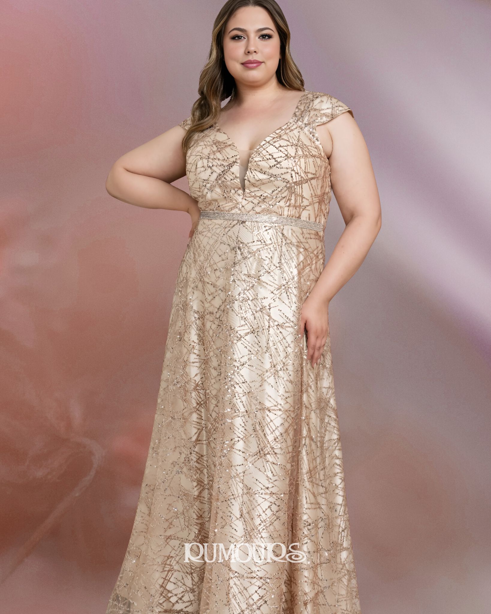 Woman in a gold sequin gown with a plunging neckline, posing with a hand on her hip.