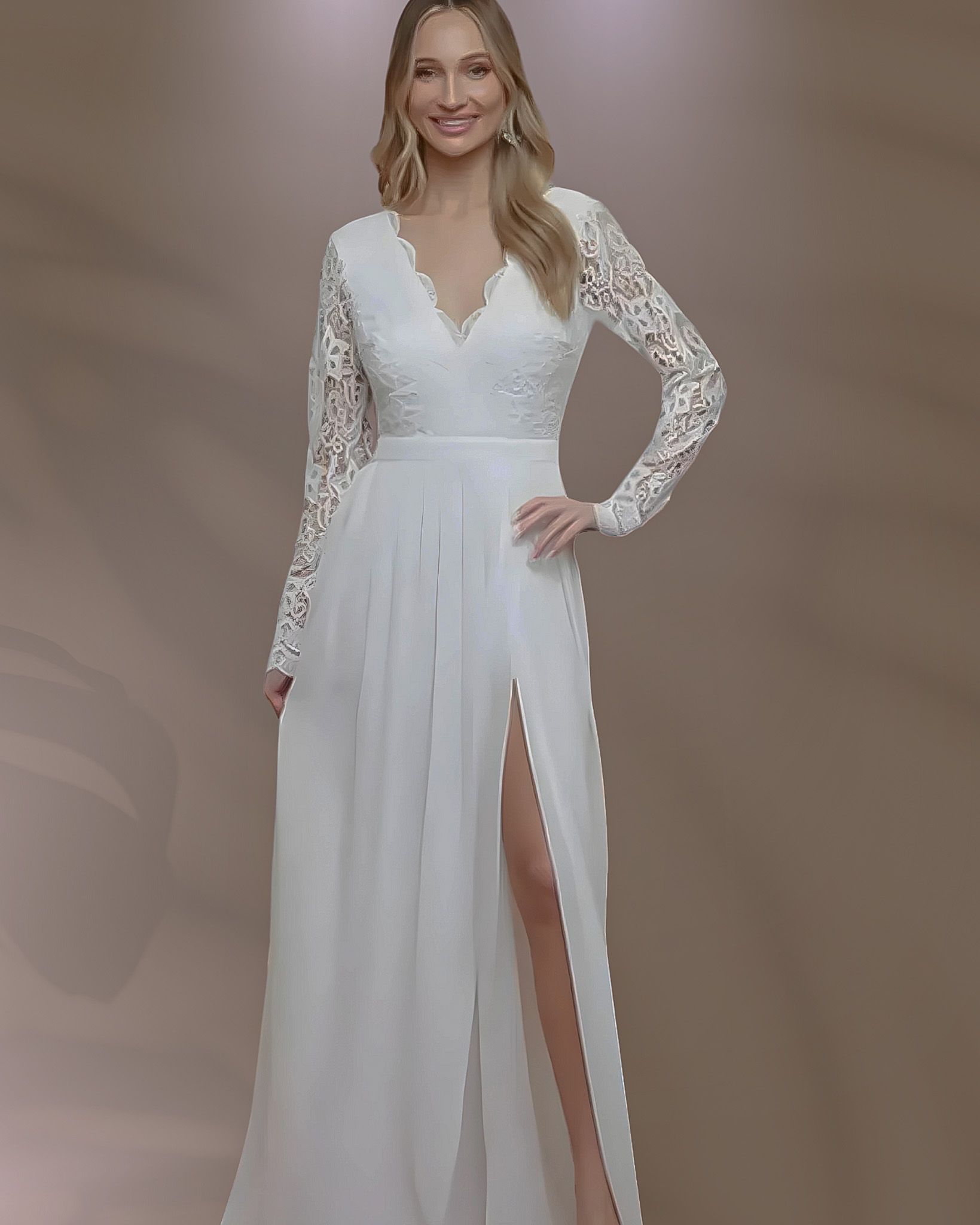 Woman in white wedding dress with lace sleeves, high slit, smiling.