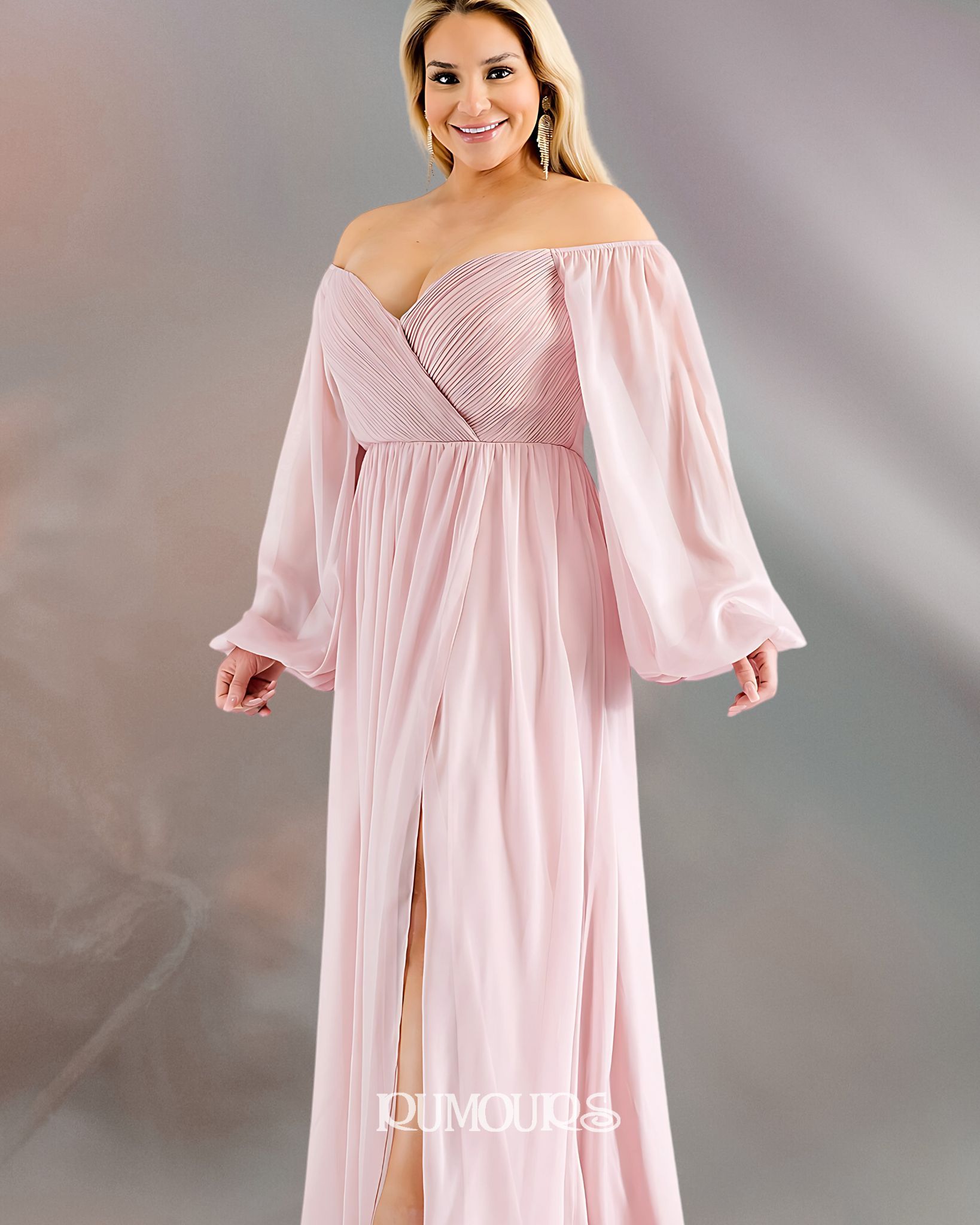 Woman in a pink off-the-shoulder dress with long sleeves, posing outdoors.