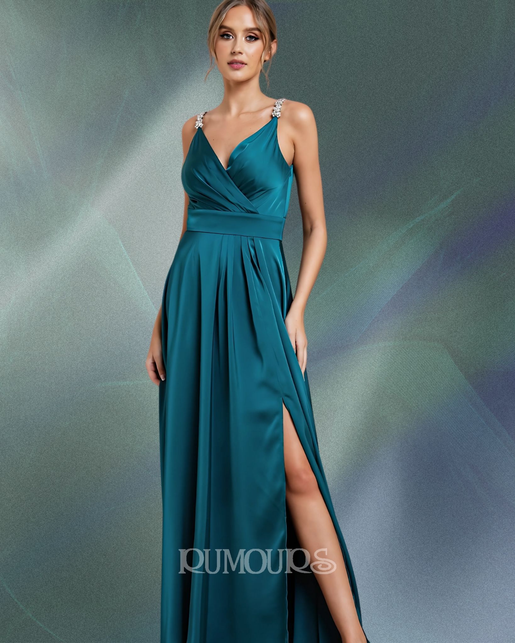 Woman in teal gown with high slit and jeweled straps, standing in front of an abstract, green backdrop.