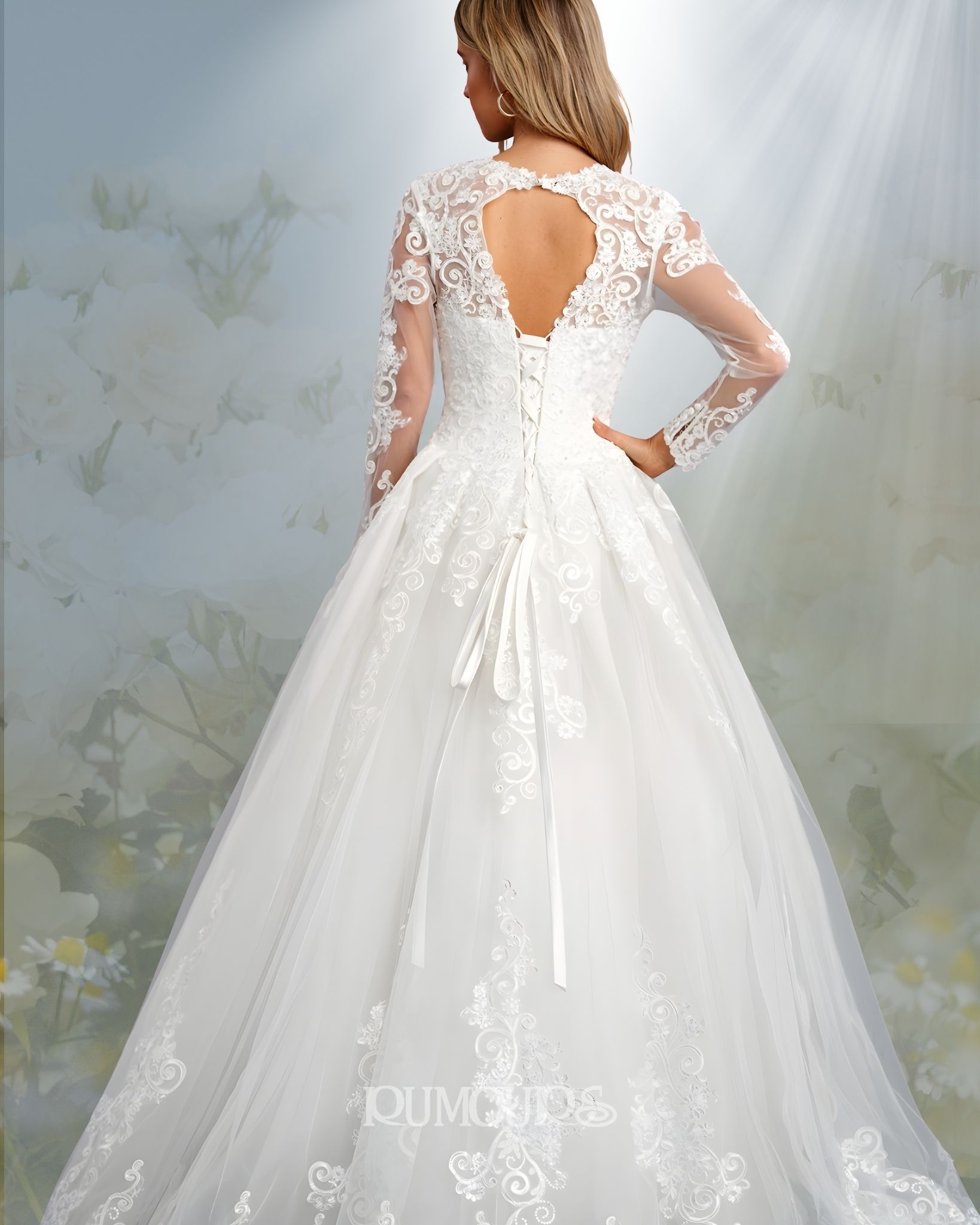 Woman in white lace wedding dress, back view, with long sleeves and open back.