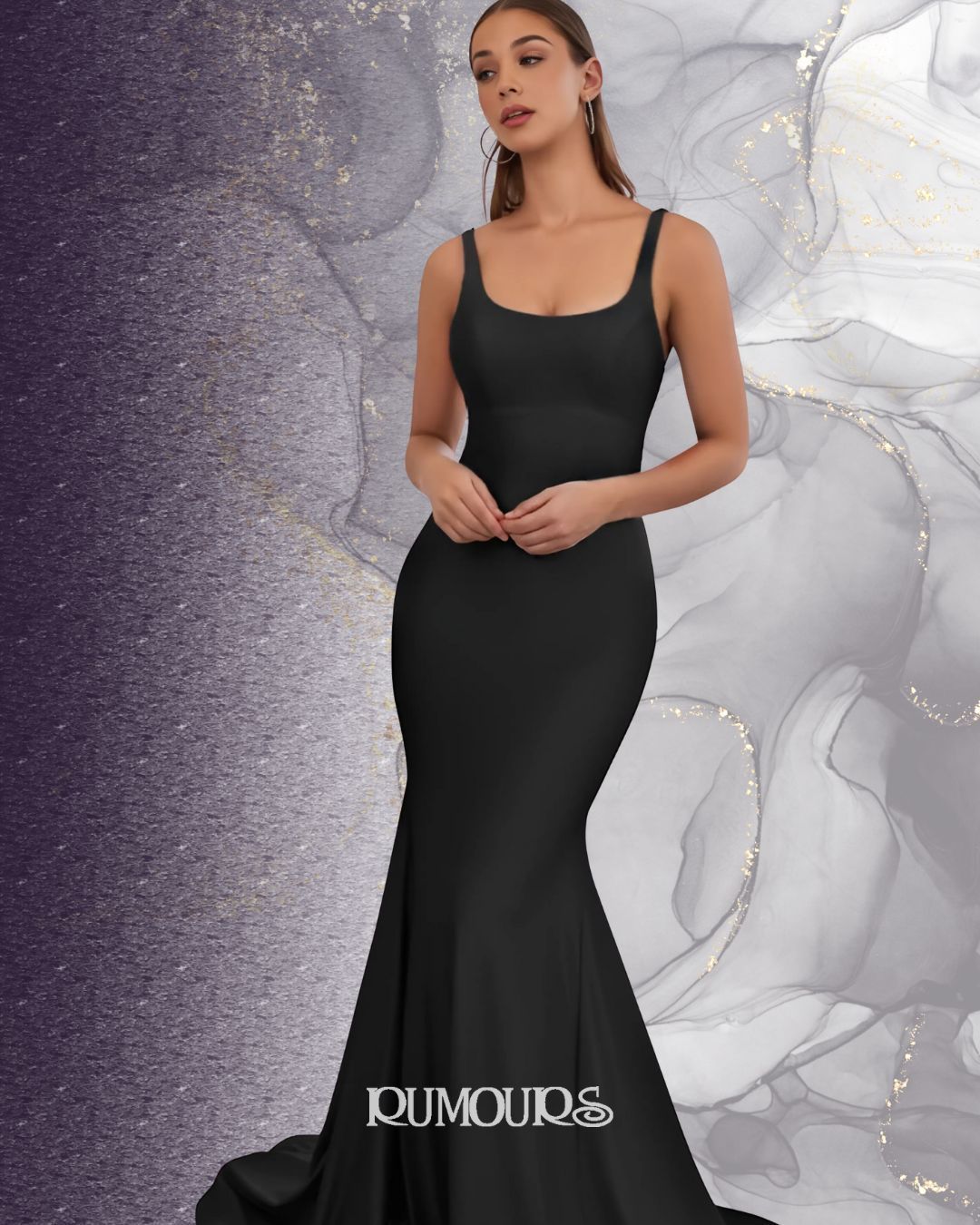 Woman in a black, form-fitting gown with a mermaid hem.