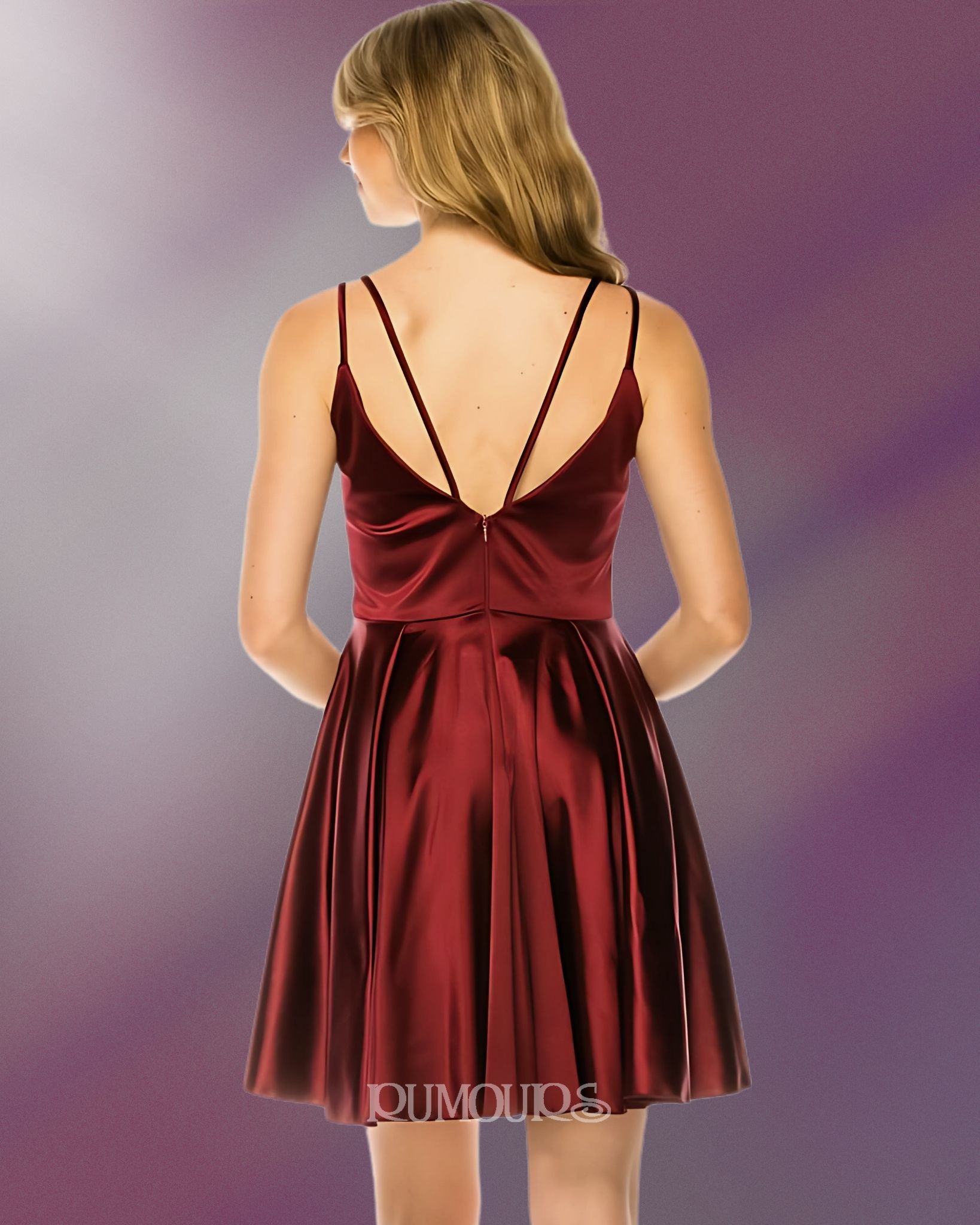 Woman in a burgundy satin dress, thin straps, standing against a purple background.
