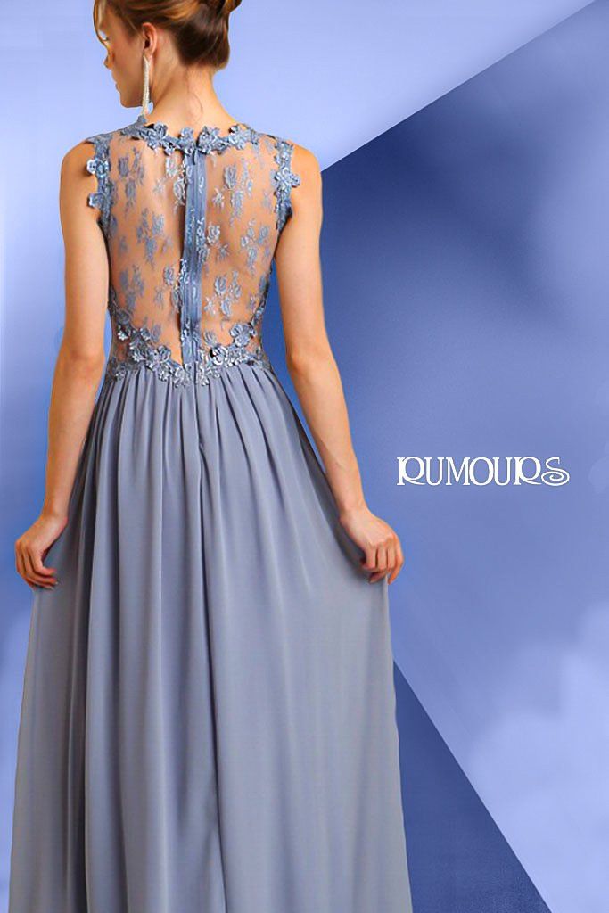 Woman in a blue gown with sheer, embellished back and holding up the skirt.