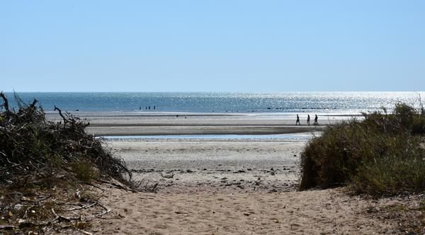 A Path Leading to A Beach with People Walking on It — Zen Luxury Retreats in Darwin City, NT