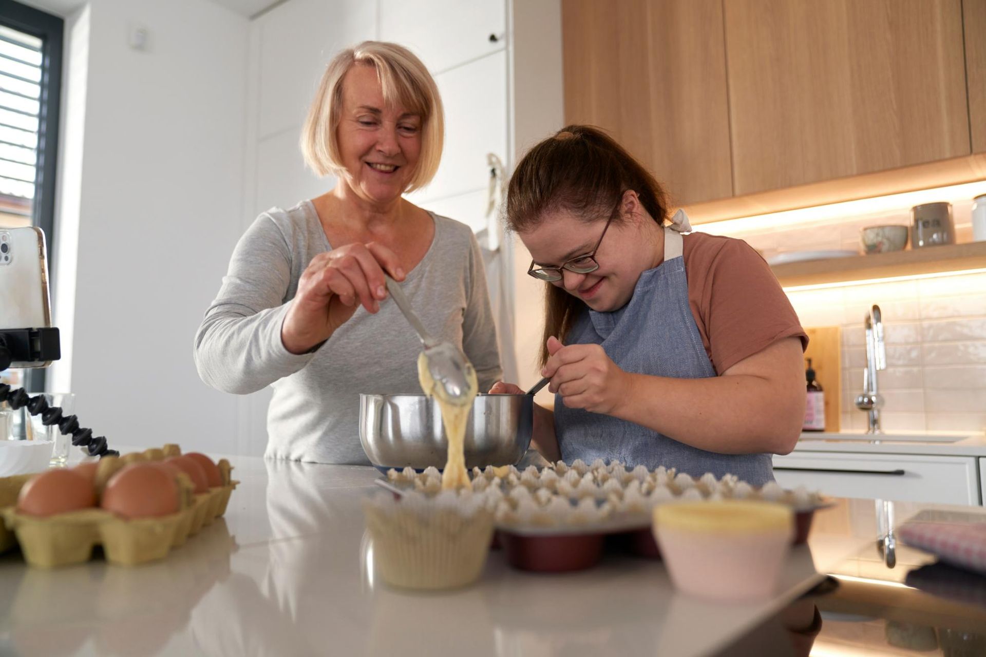 Woman and a Girl Are Preparing Food in a Kitchen — Serenity Strides in Logan, QLD