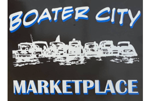 A sign for boater city marketplace with boats on it.