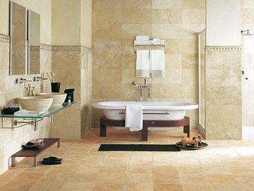 A bathroom with two sinks and a bathtub