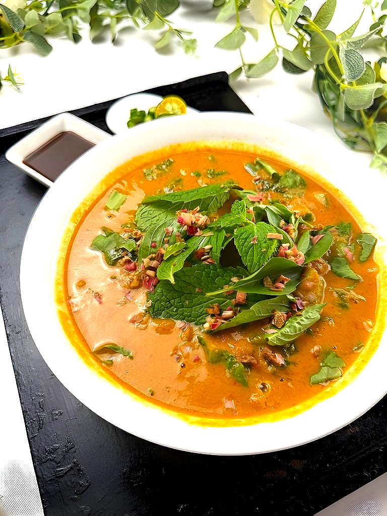 A bowl of Crab Laksa on the terrace