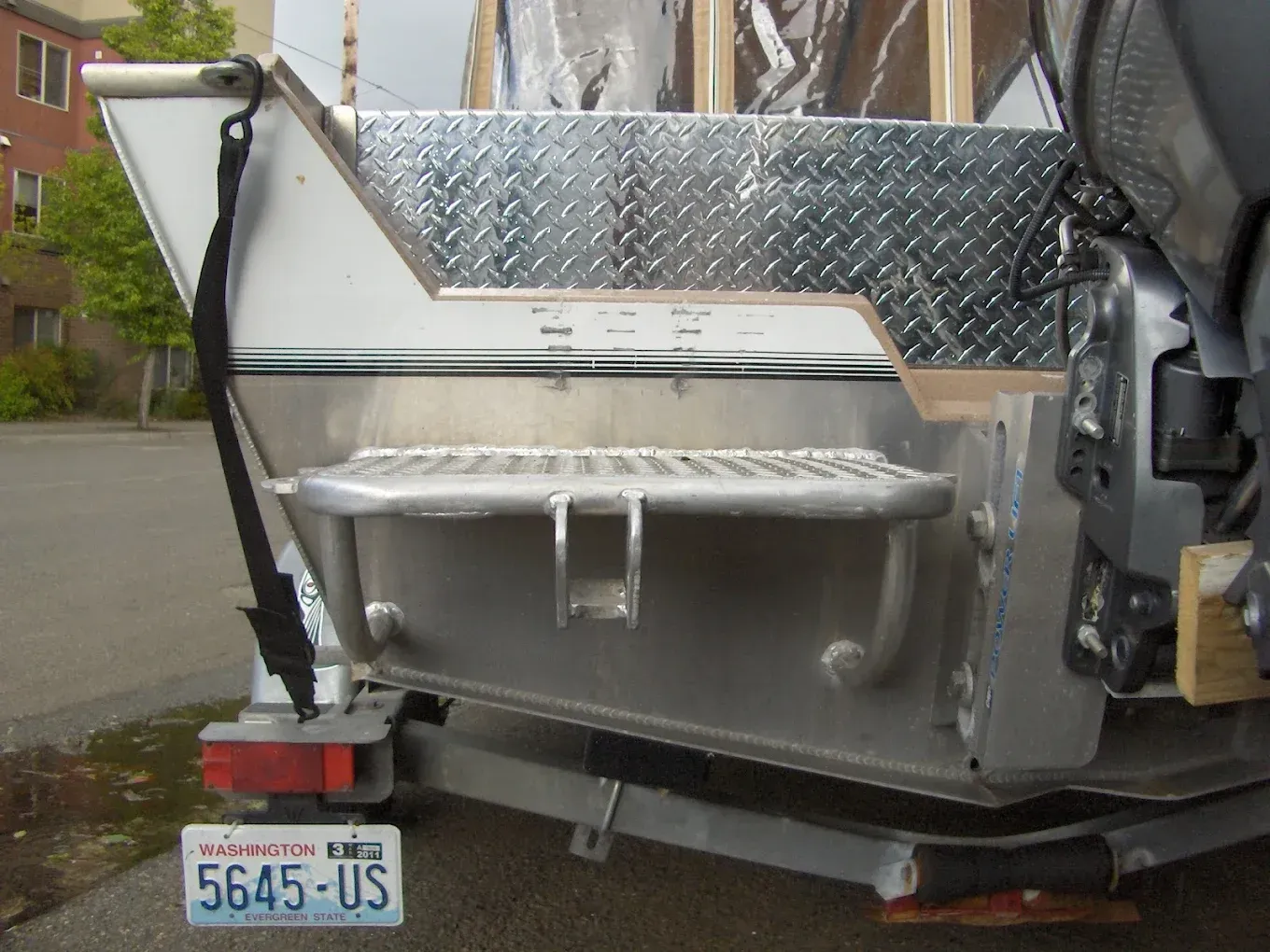 Custom fabricated steel equipment attachment with welded components