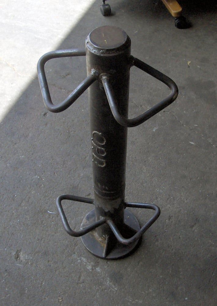 Custom fabricated steel anchor component with welded base plate