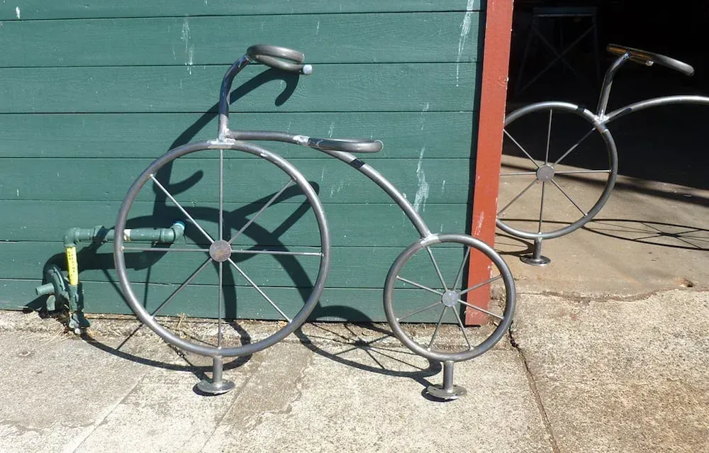 Custom fabricated steel enclosure structure with welded frame design
