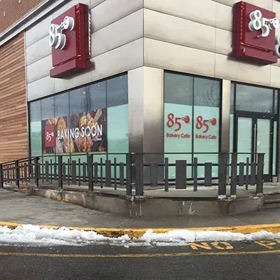 Commercial storefront with custom welded steel perimeter railing system