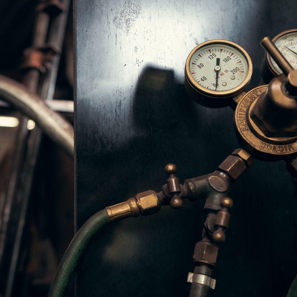 Industrial gas regulator and pressure gauge on welding equipment