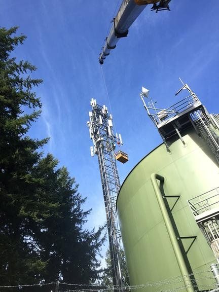 Industrial tank structure with mounted steel platforms and equipment