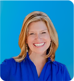 Smiling woman in a blue blouse against a bright blue background