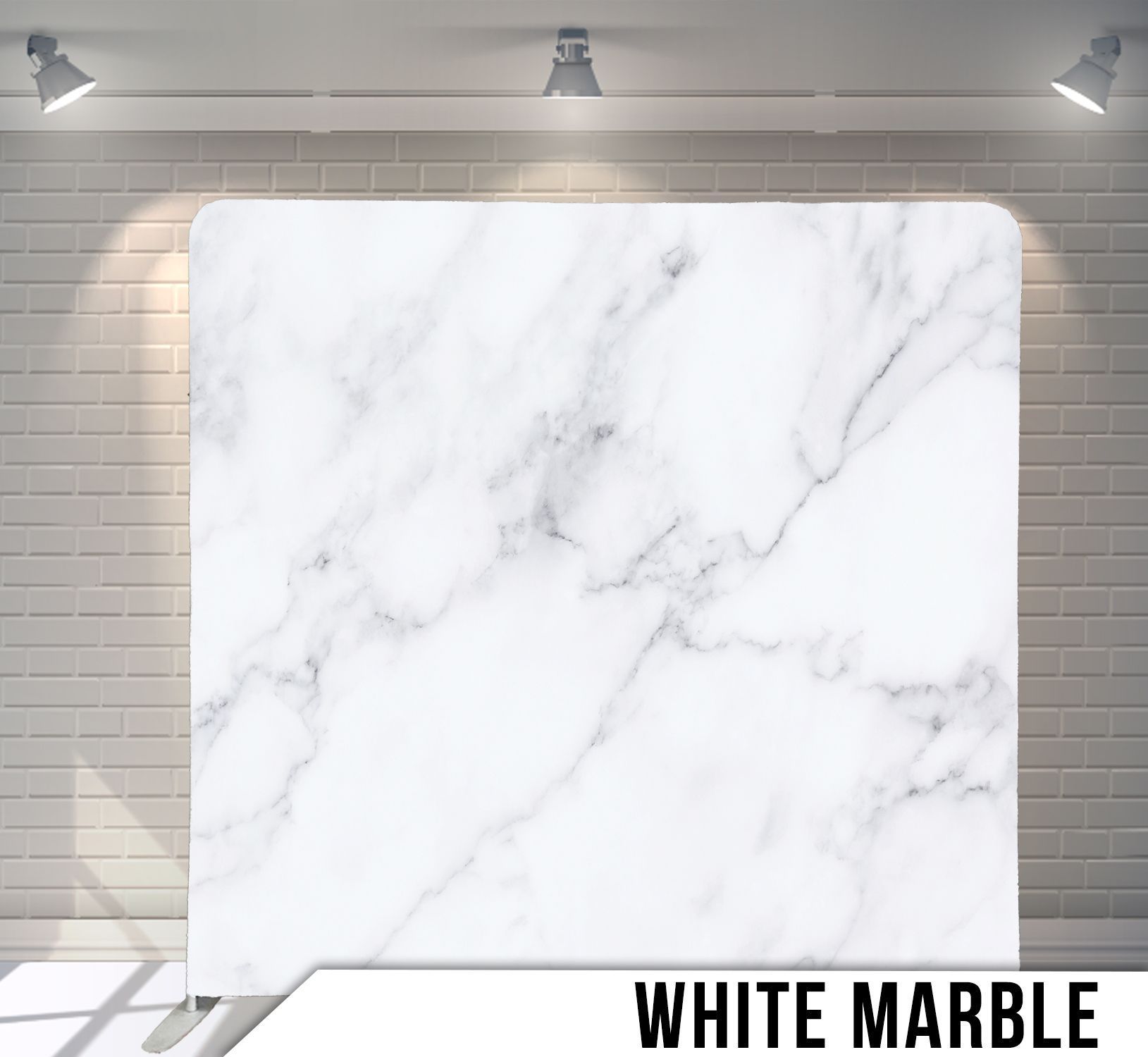 White marble backdrop with subtle gray veining. Ideal for photos, against a white brick wall and spotlights.