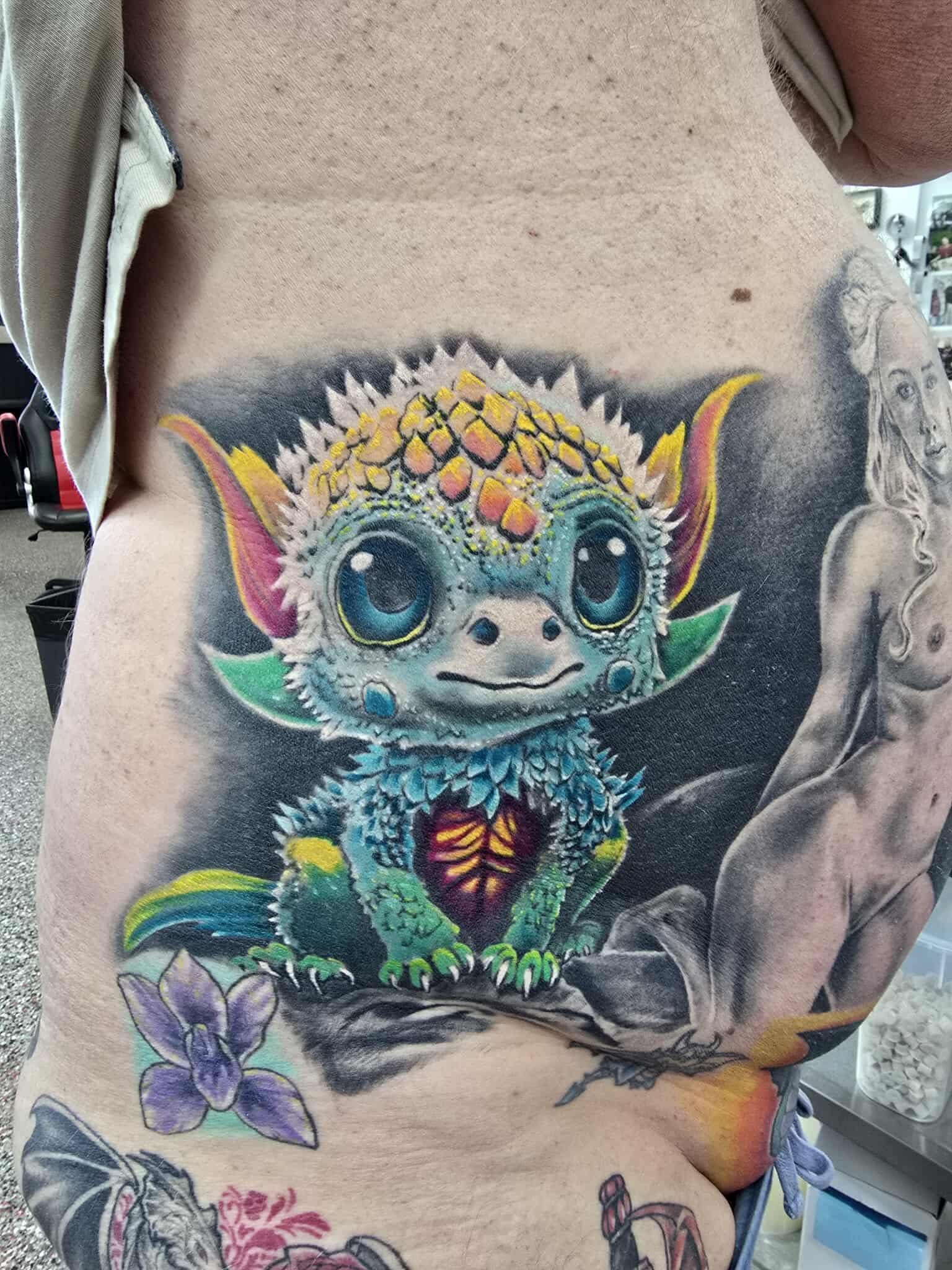 Tattoo of a Cute, Colorful Dragon-like Creature — Redback !nk Tattoo Studio in Kawana, QLD