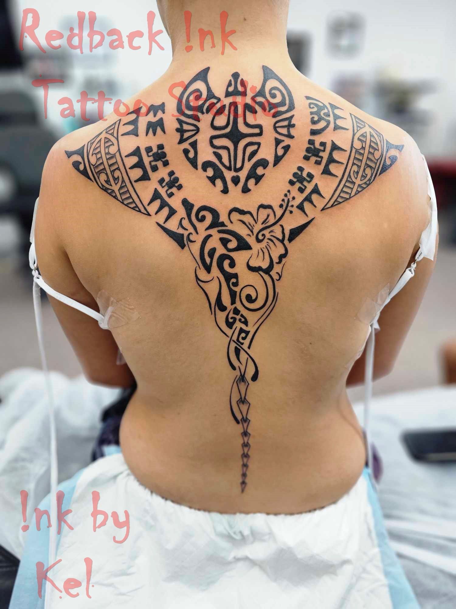 Tattoo of a Black Manta Ray on a Person's Back — Redback !nk Tattoo Studio in Kawana, QLD