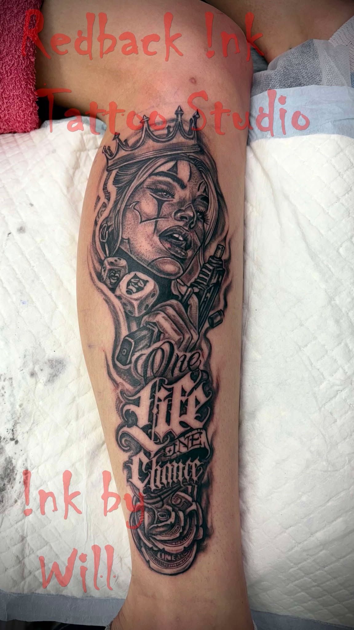 Leg Tattoo of a Clown Face Wearing a Crown — Redback !nk Tattoo Studio in Kawana, QLD