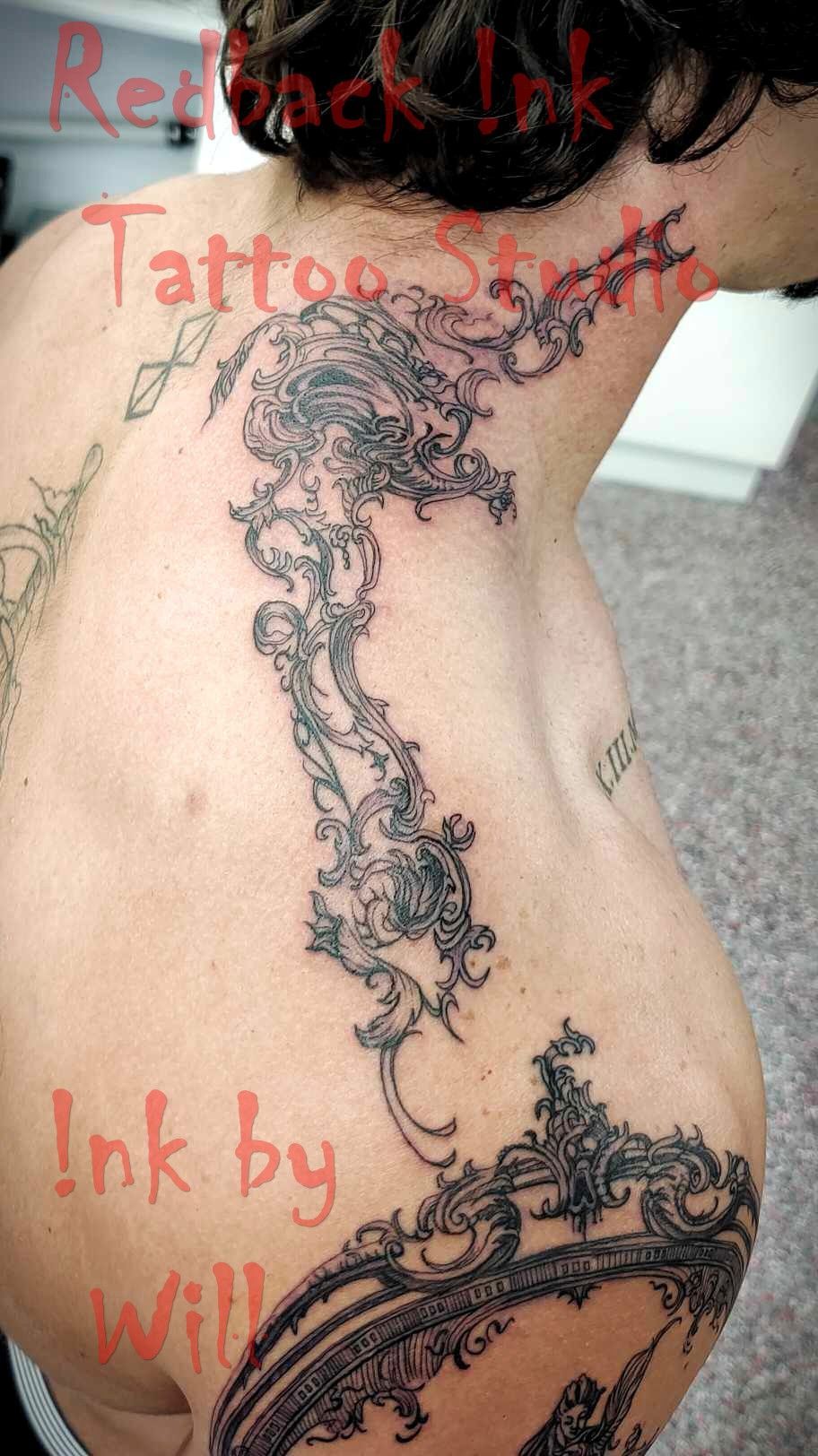 Tattoo of Ornate Design on Person's Back and Neck — Redback !nk Tattoo Studio in Kawana, QLD